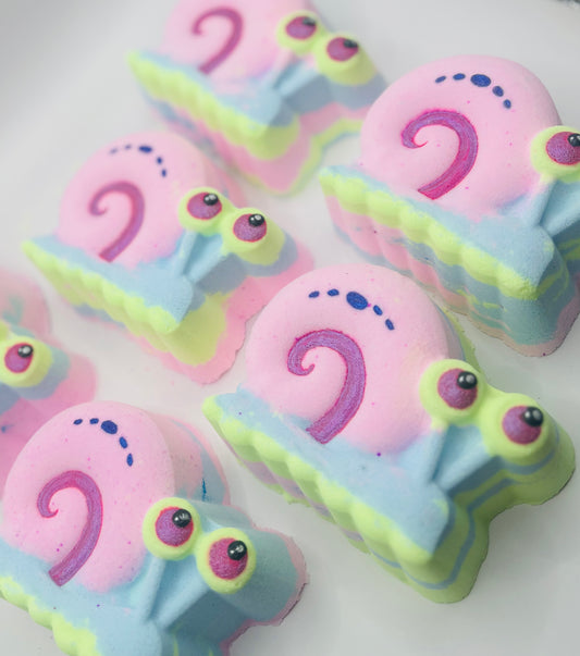 a huge pastel coloured bath bomb shaped as Gary the snail from spongebob squarepants.